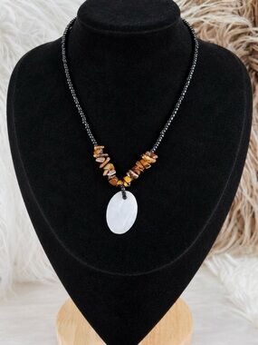 Black and brown beaded shell pendant Bohemian Island chic necklace
